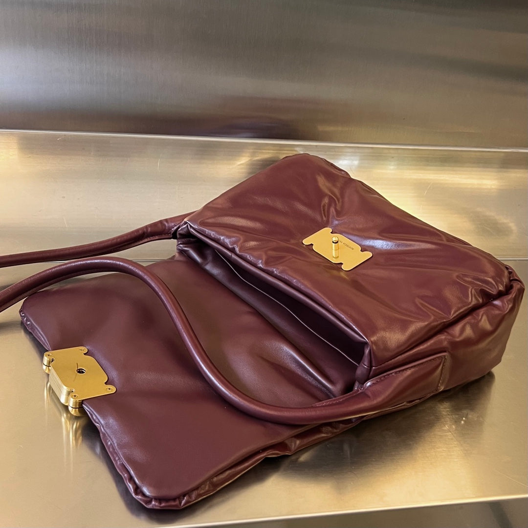 PAD PUFFER BAG 29 IN PLUM Lila COWHIDE Leder